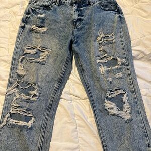 Distressed Blue Denim Jeans